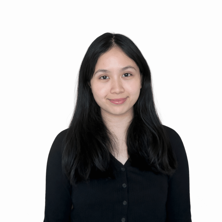 Sabrina Tanjung, SMSF Accountant at SMSF Warehouse, smiling in a black cardigan against a white background.